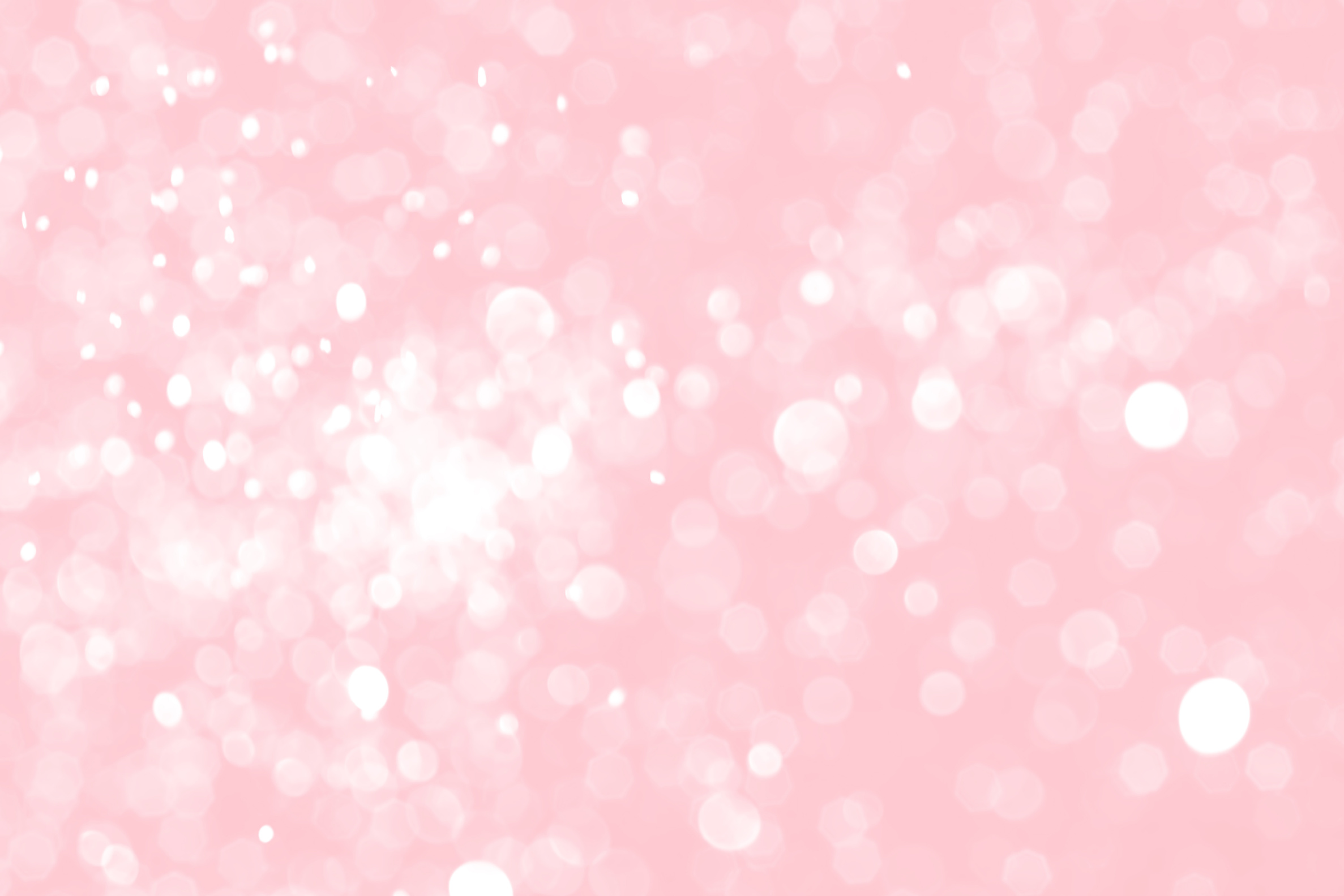 Pink sparkling glitter bokeh background, abstract defocused